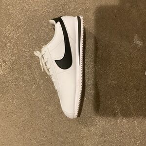 White and Black Nike Cortez